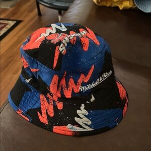 Mitchell & Ness Reversible NY Knicks Bucket Hat - Black, Blue, and Red